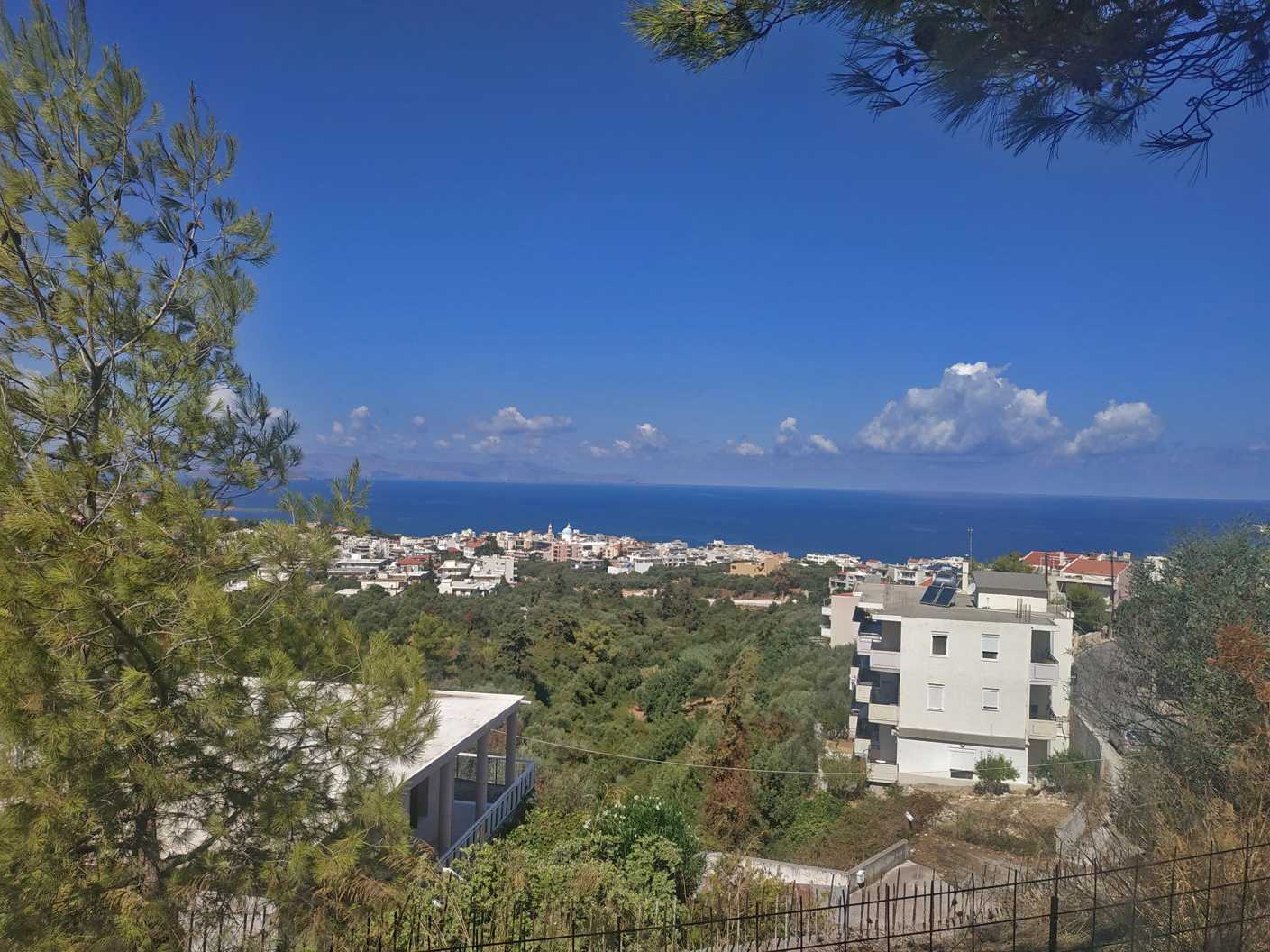 Land with two houses for sale in Chalepa. ID 03-2142