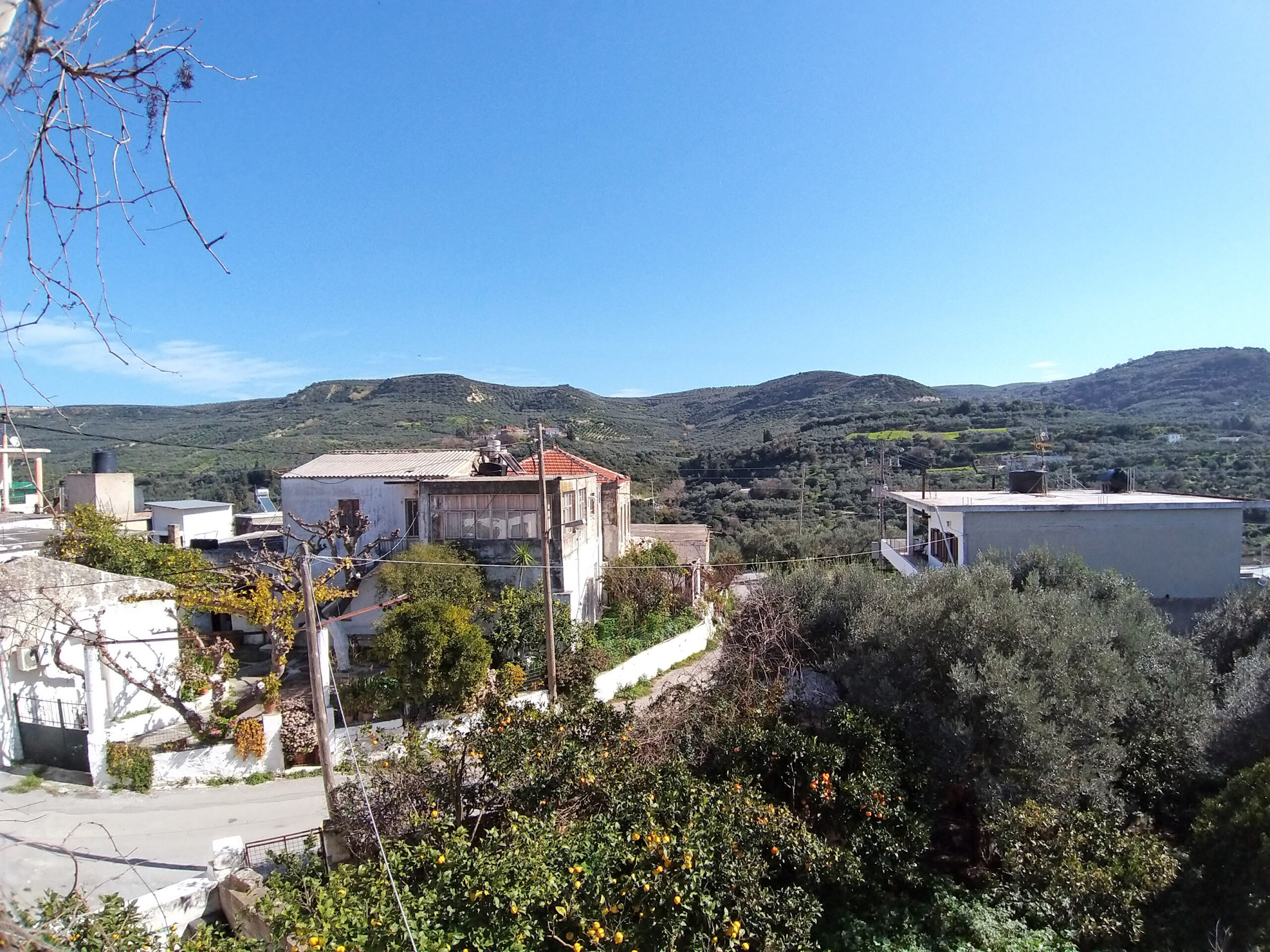 Two bedroom apartment with a ground floor shop for sale in Platanias, Crete. ID 04-1268