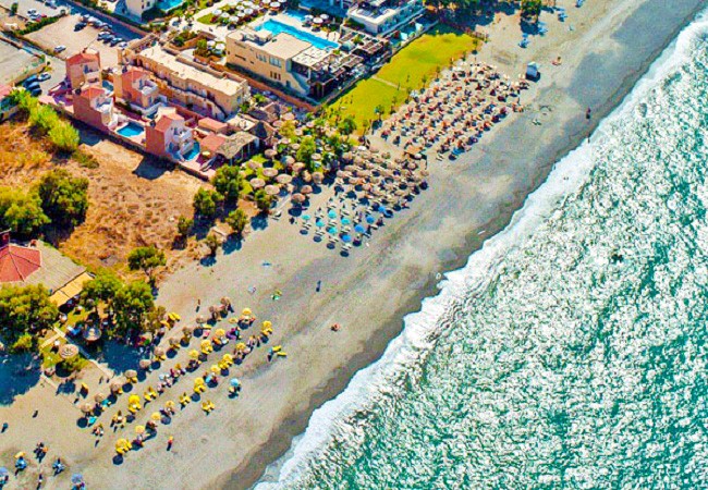 Sea-front hotel with four luxurious villas and a beach bar for sale in Crete. ID 02-327