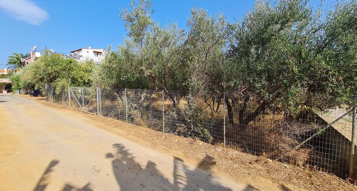 Plot for sale in Agii Apostoli Chania with a building license for four houses. ID 03-1700