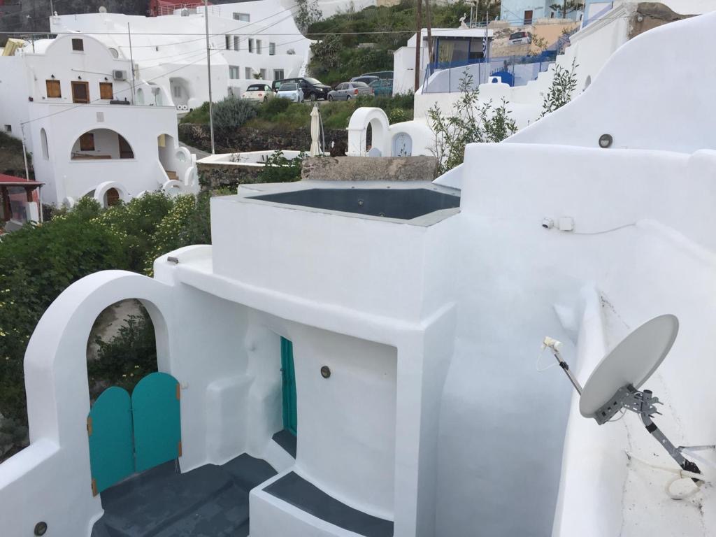 Property with Four Cave Houses for sale in Santorini. ID S4-7438